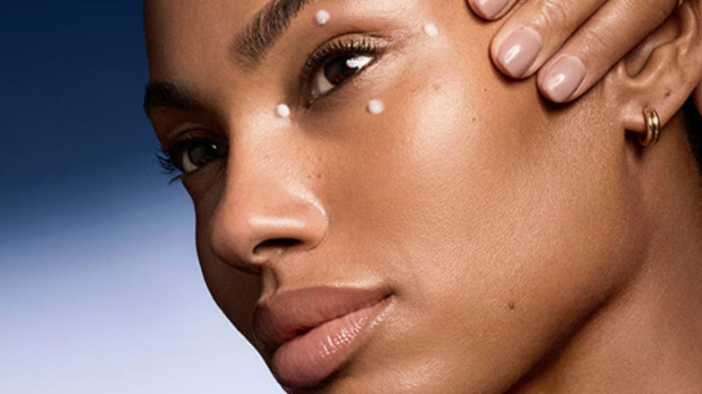 Woman with hand on face, promoting 'The Eye Lift' with text about results.