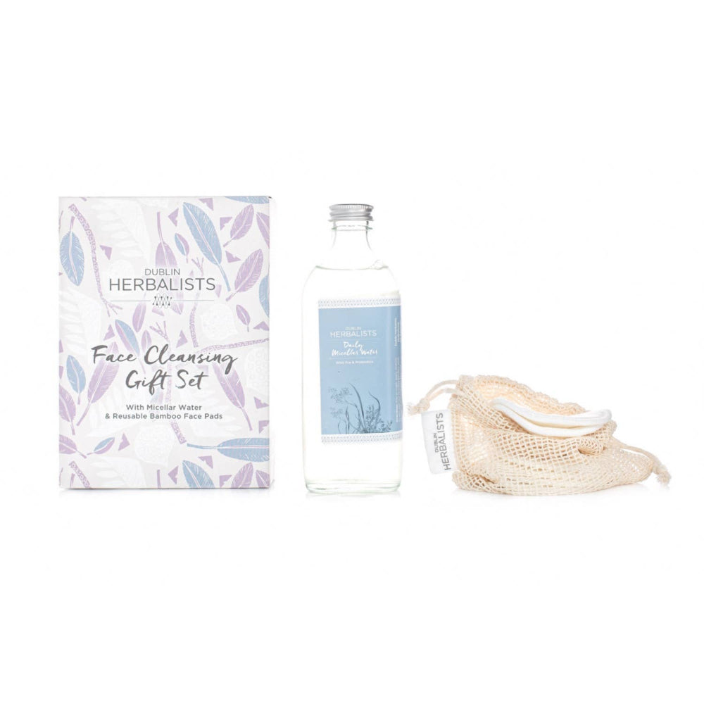 Herbalists face cleansing gift set with packaging, bottle, and mesh bag on a white background