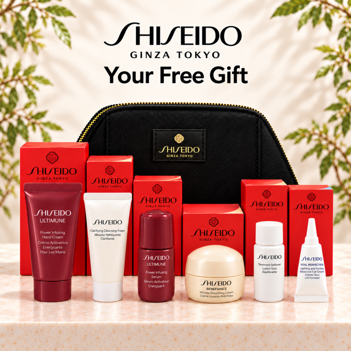 Shiseido Ginza Tokyo free gift set featuring a black zippered pouch, red and white skincare bottles, a cream jar, and red boxes arranged on a marble surface with decorative leaves in the background.