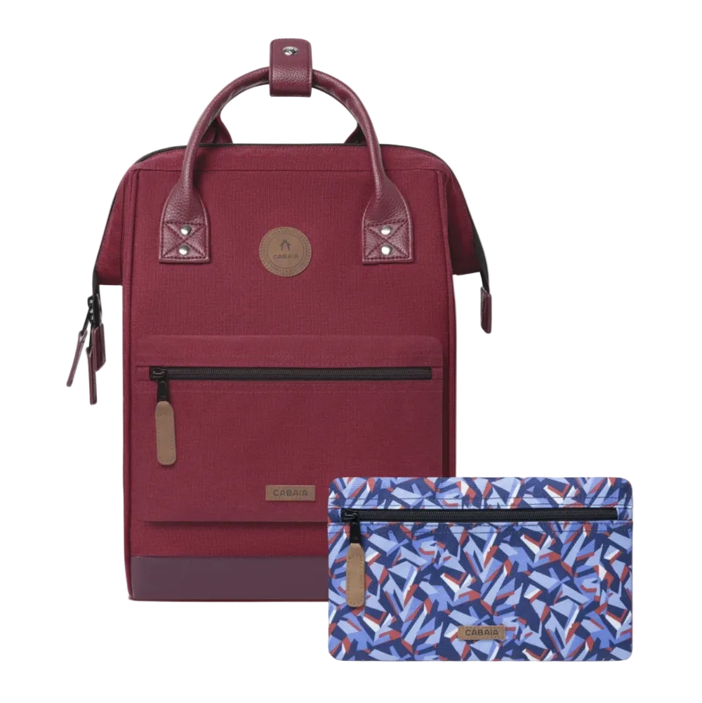 A burgundy backpack with brown leather accents and a matching patterned zip pouch, shown on a clean white background.