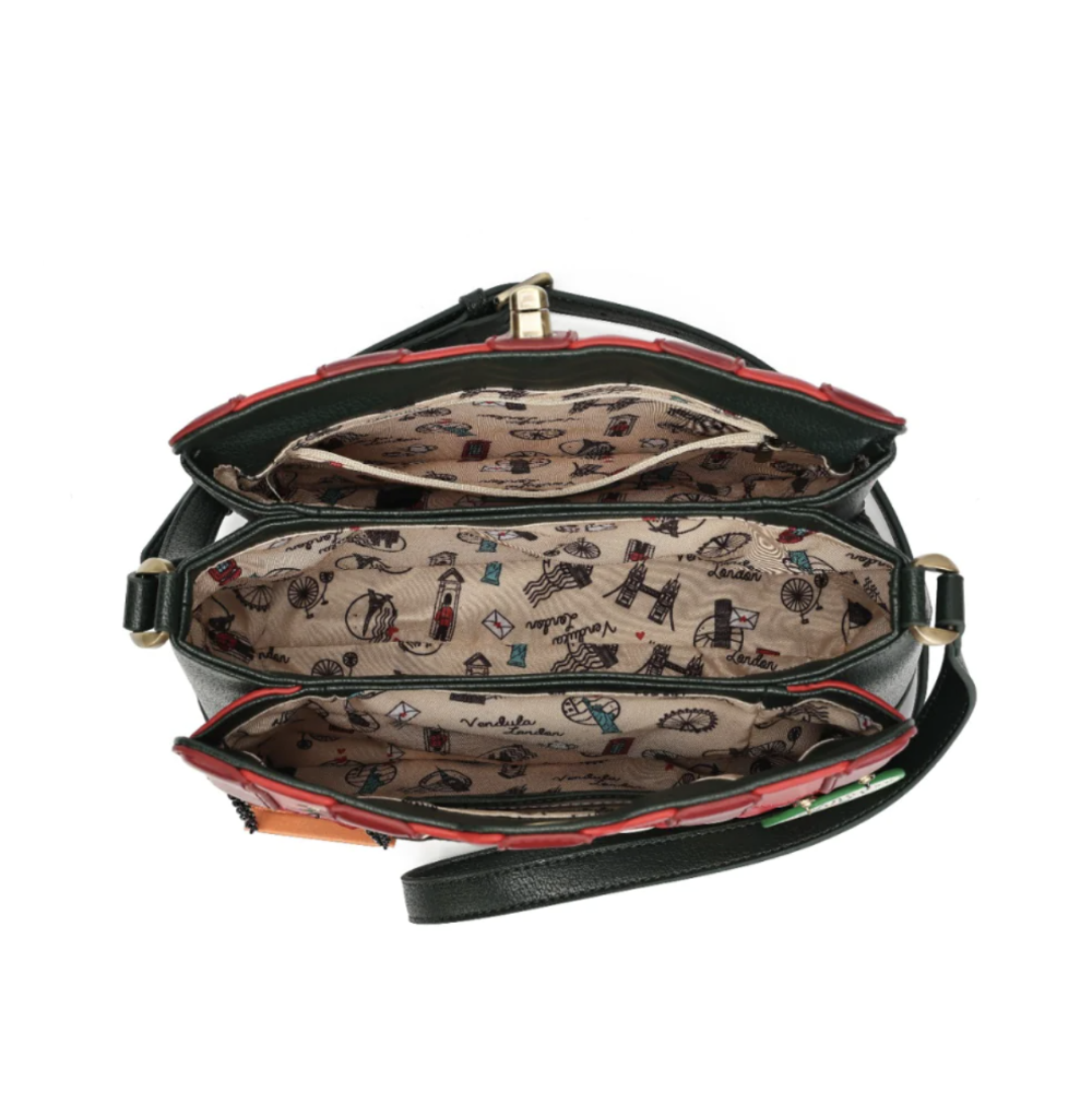 An open dark green shoulder bag with a patterned beige lining, showing multiple compartments and a long strap against a white background.