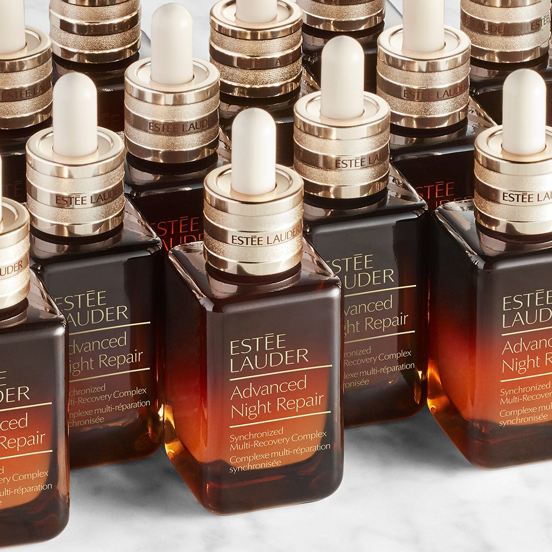 Estée Lauder Advanced Night Repair serum bottles on a light background
