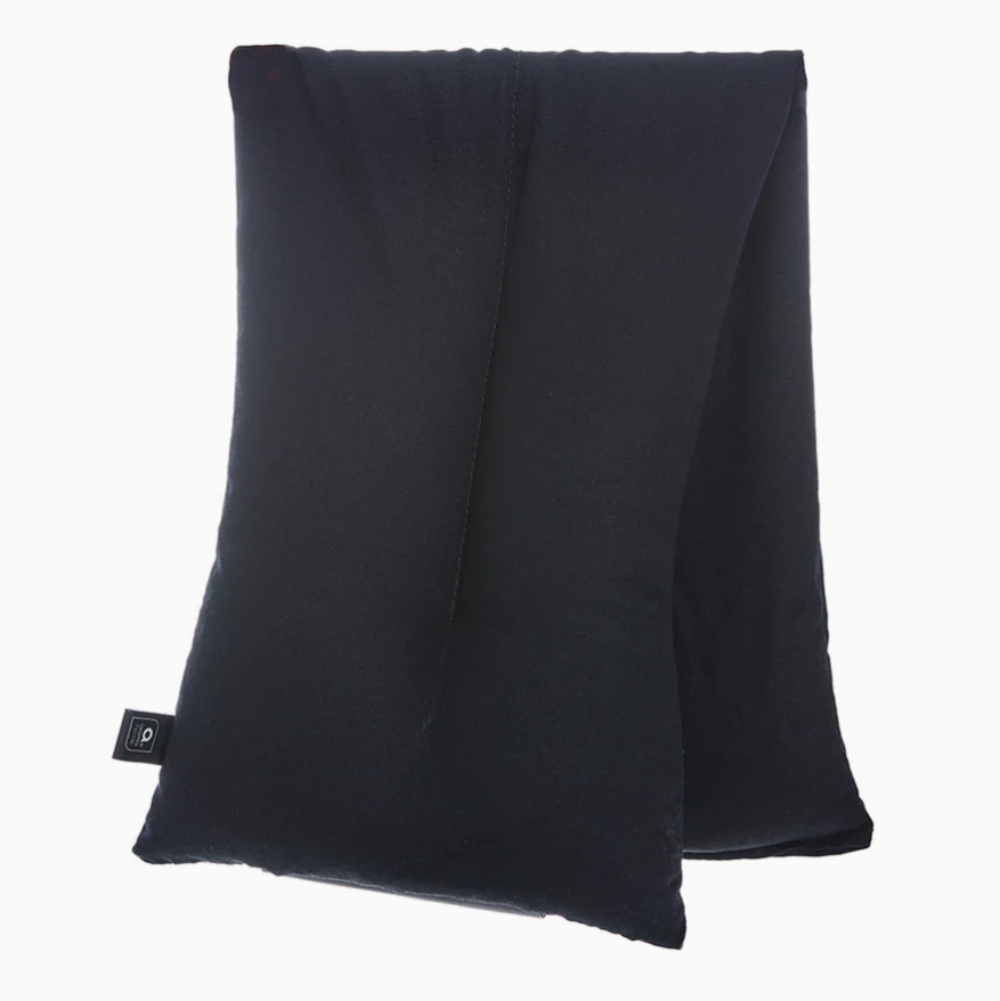 Black fabric square with a brand label on a white background