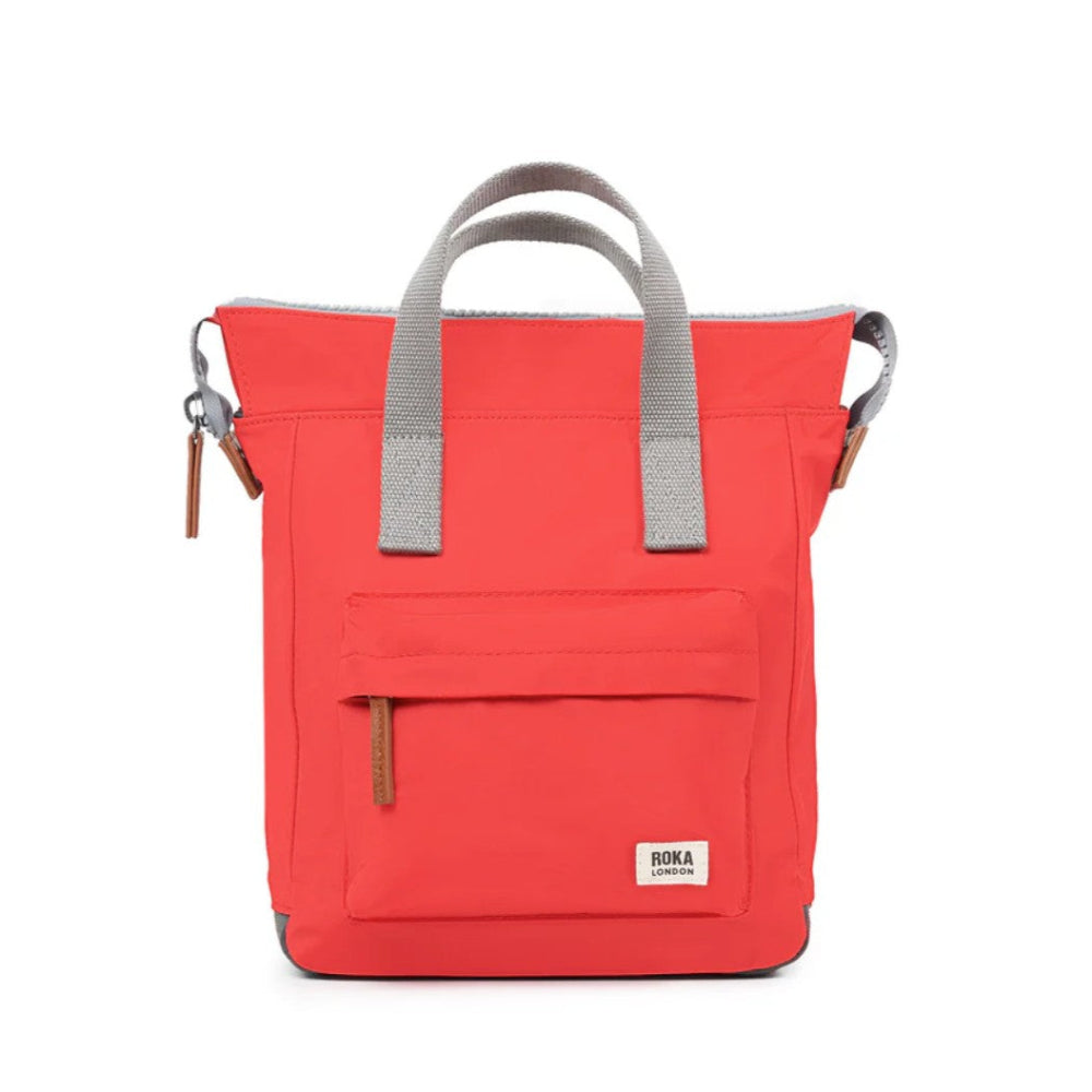 Red backpack with gray straps on a white background