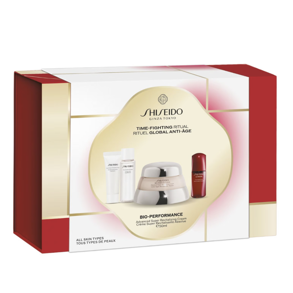 Shiseido Anti-Age gift set in a white, red, and gold box, showing the packaging design with the product contents visible through a central cutout.