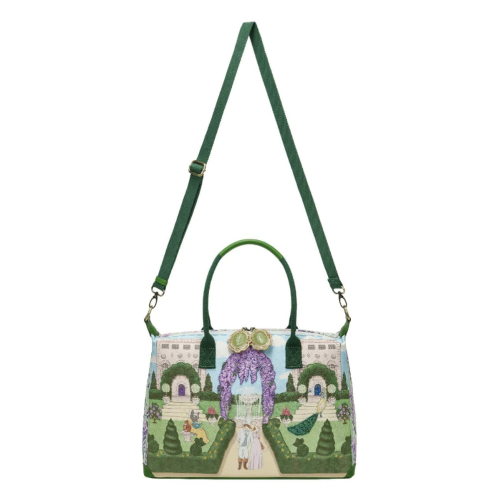 Handbag with garden scene design on a white background