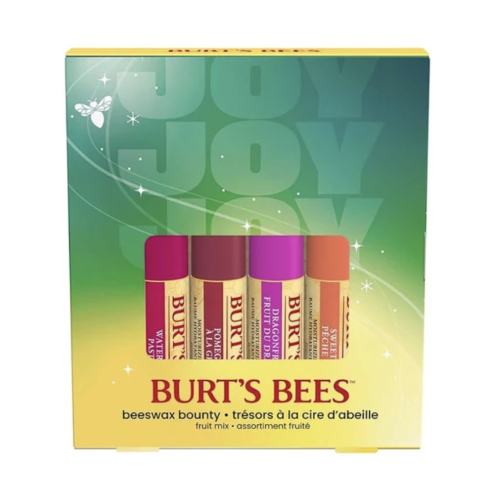 Burt's Bees Beeswax Bounty lip balm set in a yellow and green gift box, featuring five tubes of lip balm in pink, mauve, purple, and orange shades.