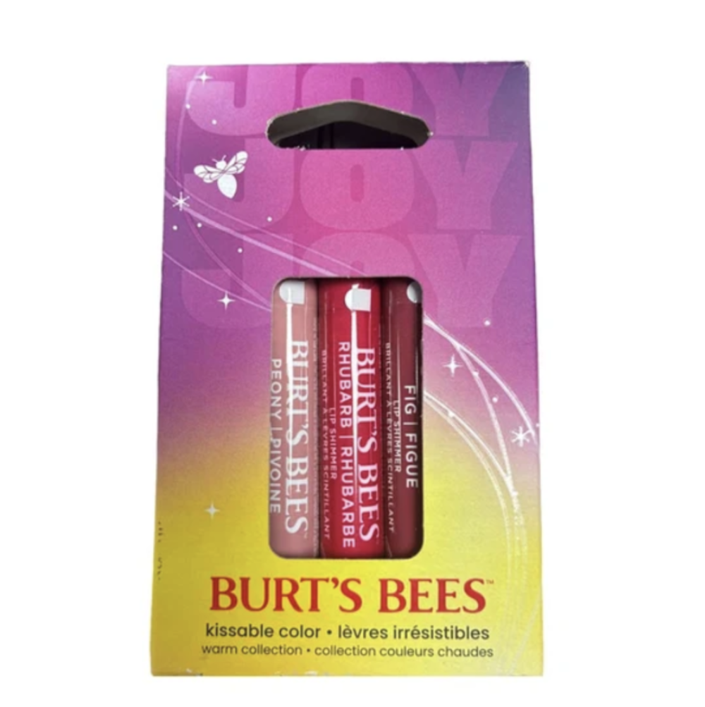 Burt's Bees Kissable Color lipstick set in its original retail packaging, featuring a purple-to-yellow gradient box with a clear window showing two red lipsticks.