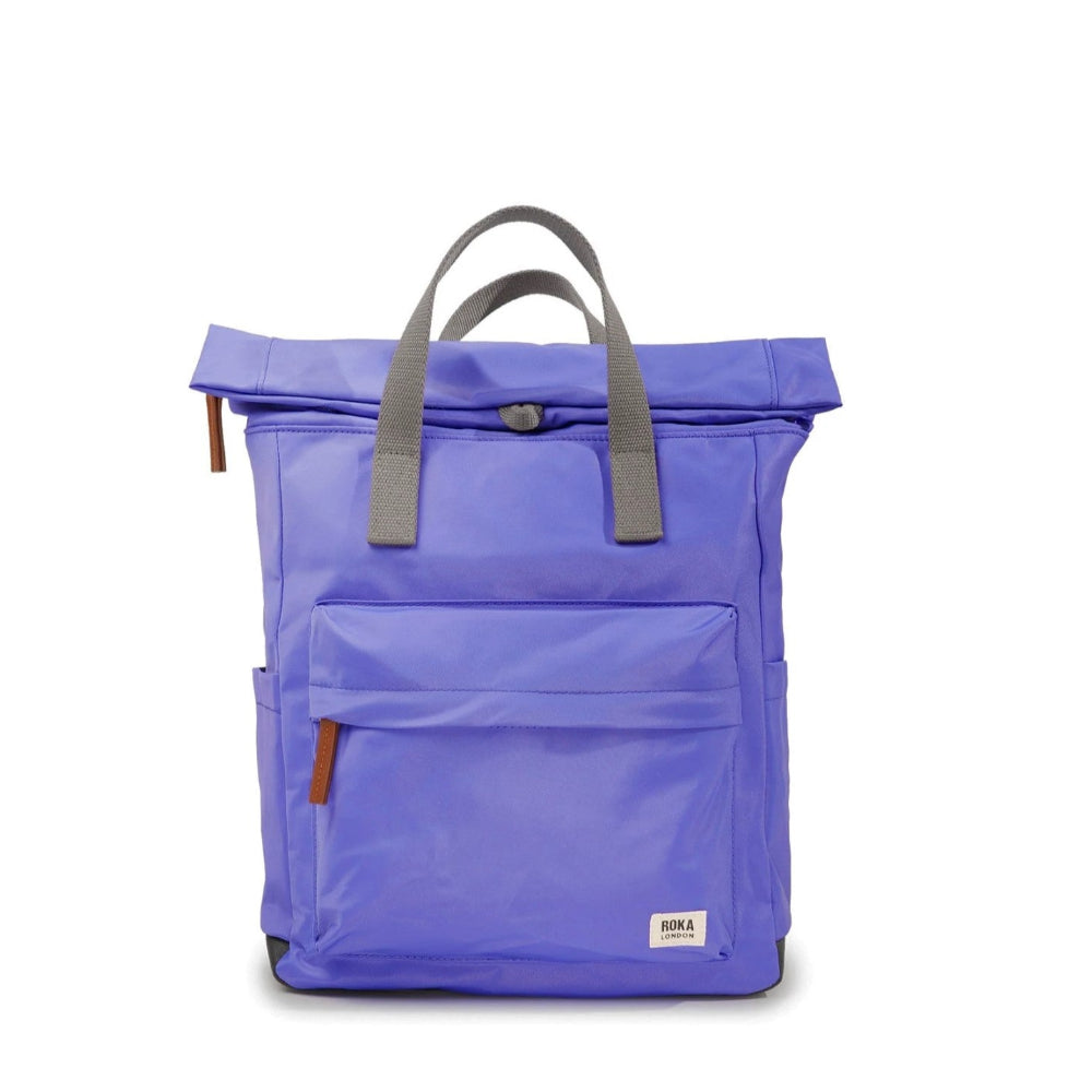 Purple backpack with gray straps on a white background