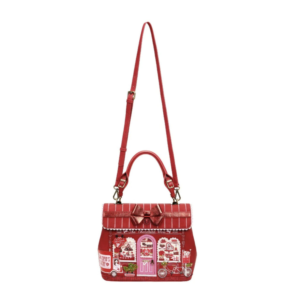 Red handbag with a pattern on a white background