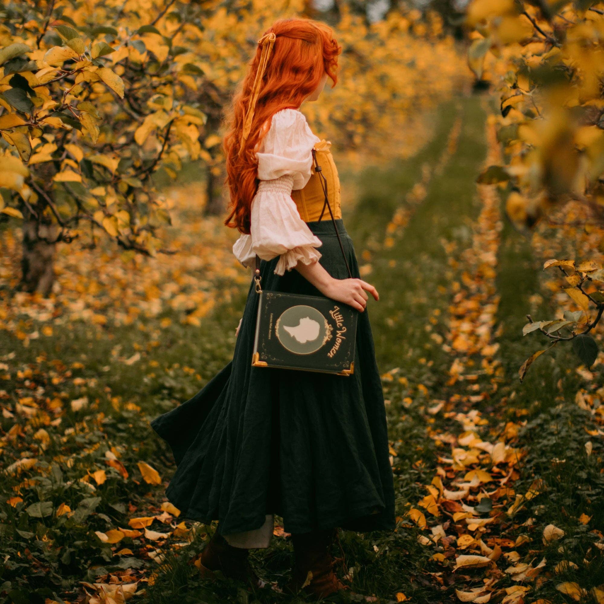 Book-shaped handbag with 'Little Women' design