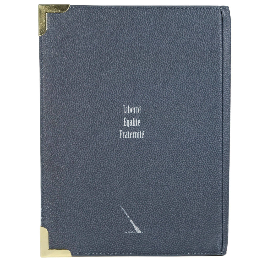 Blue leather-bound book with gold corners and text on a white background