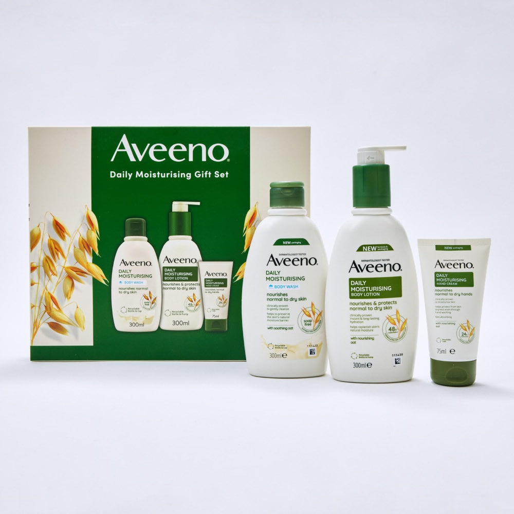 Aveeno daily moisturizing gift set with bottles and a box on a white background