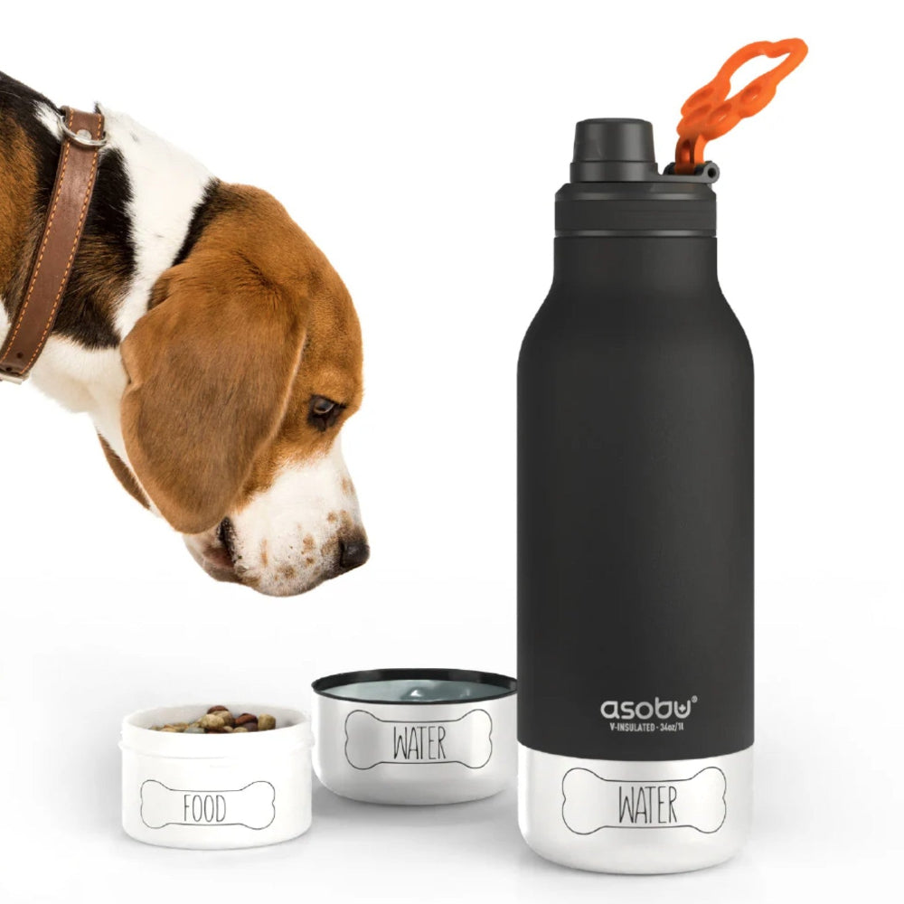 Black water bottle with orange cap next to a dog and pet bowls on a white background