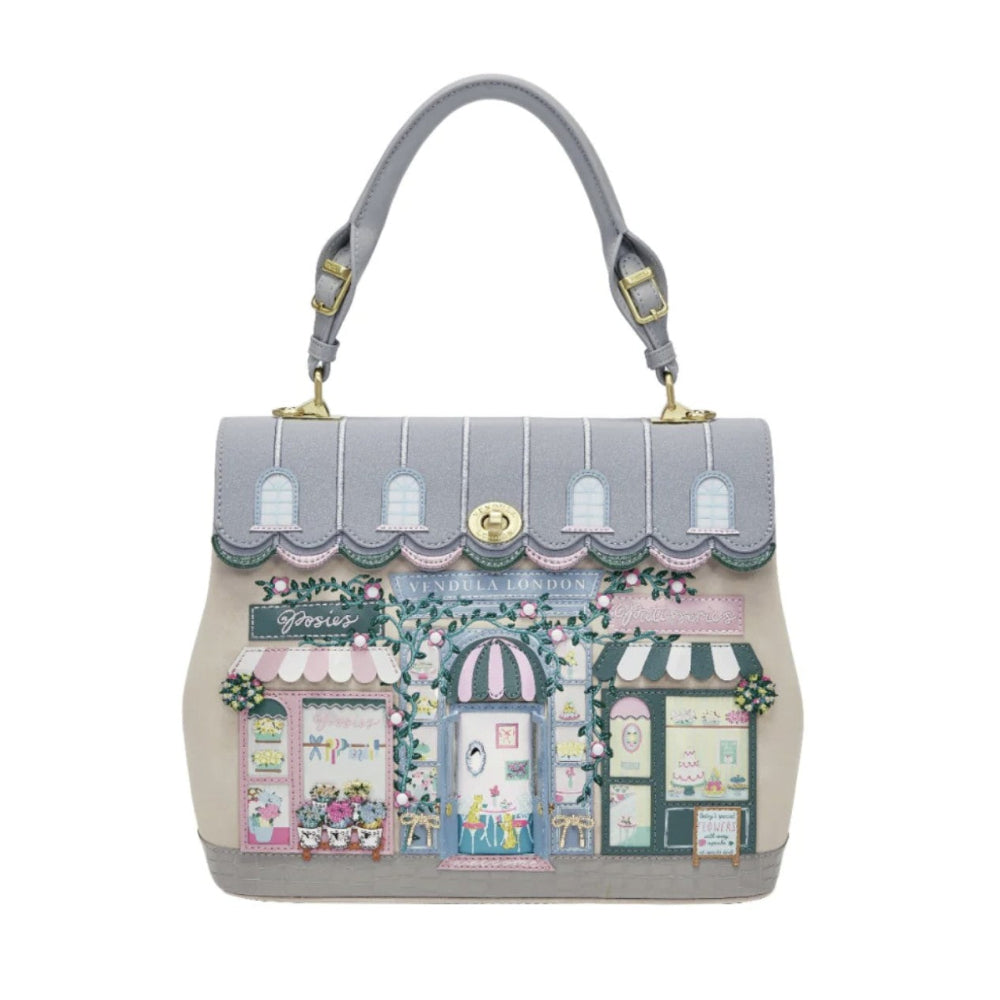 Handbag with a design of shop fronts on a white background