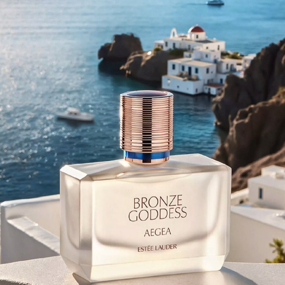 Estée Lauder Bronze Goddess Aegea Eau De Parfum 50ml with Greek sea in background
