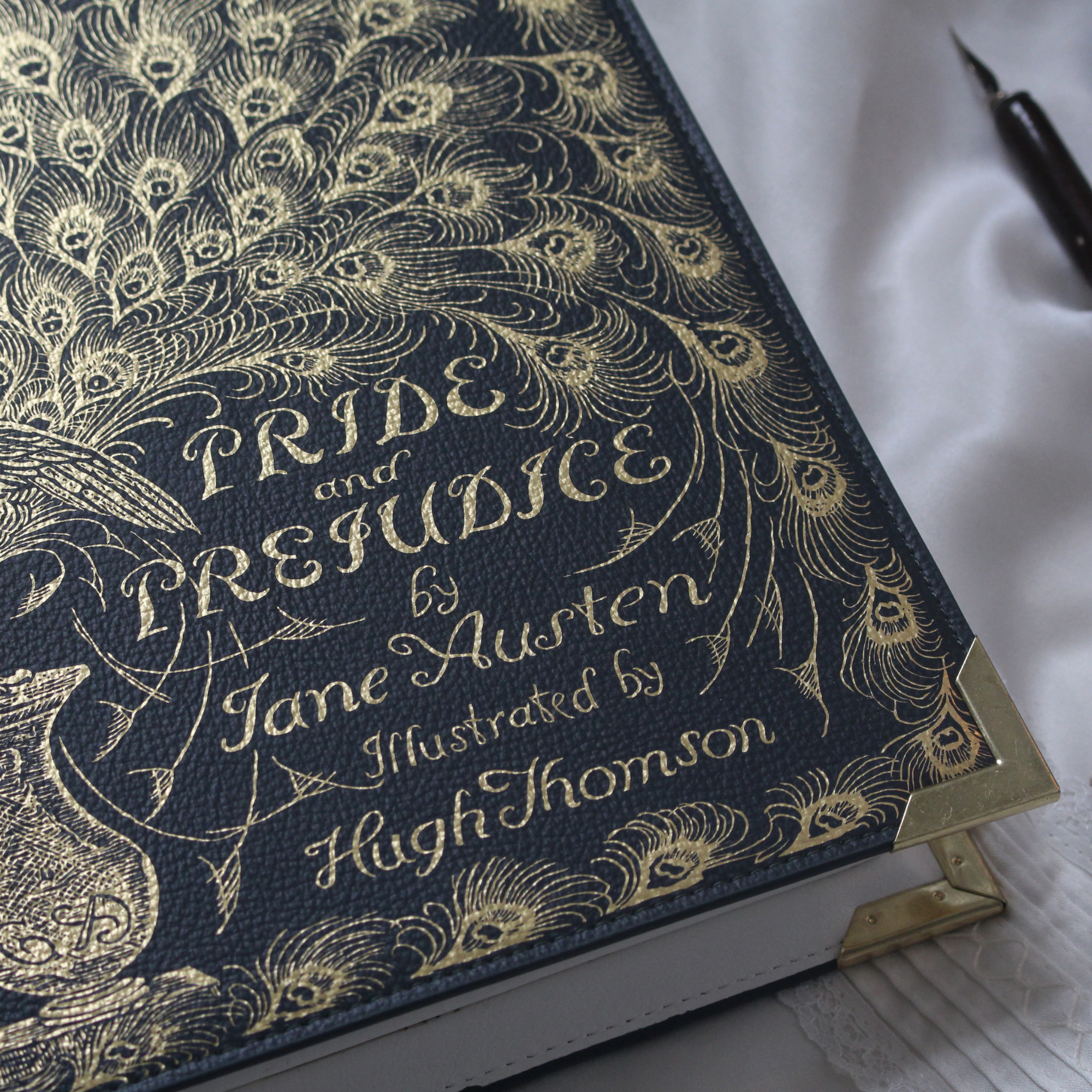 Book-shaped handbag with 'Pride and Prejudice' design on a white background