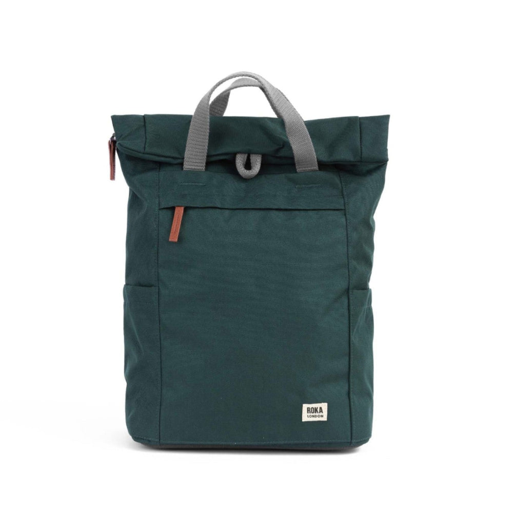 Green backpack with gray handle on a white background