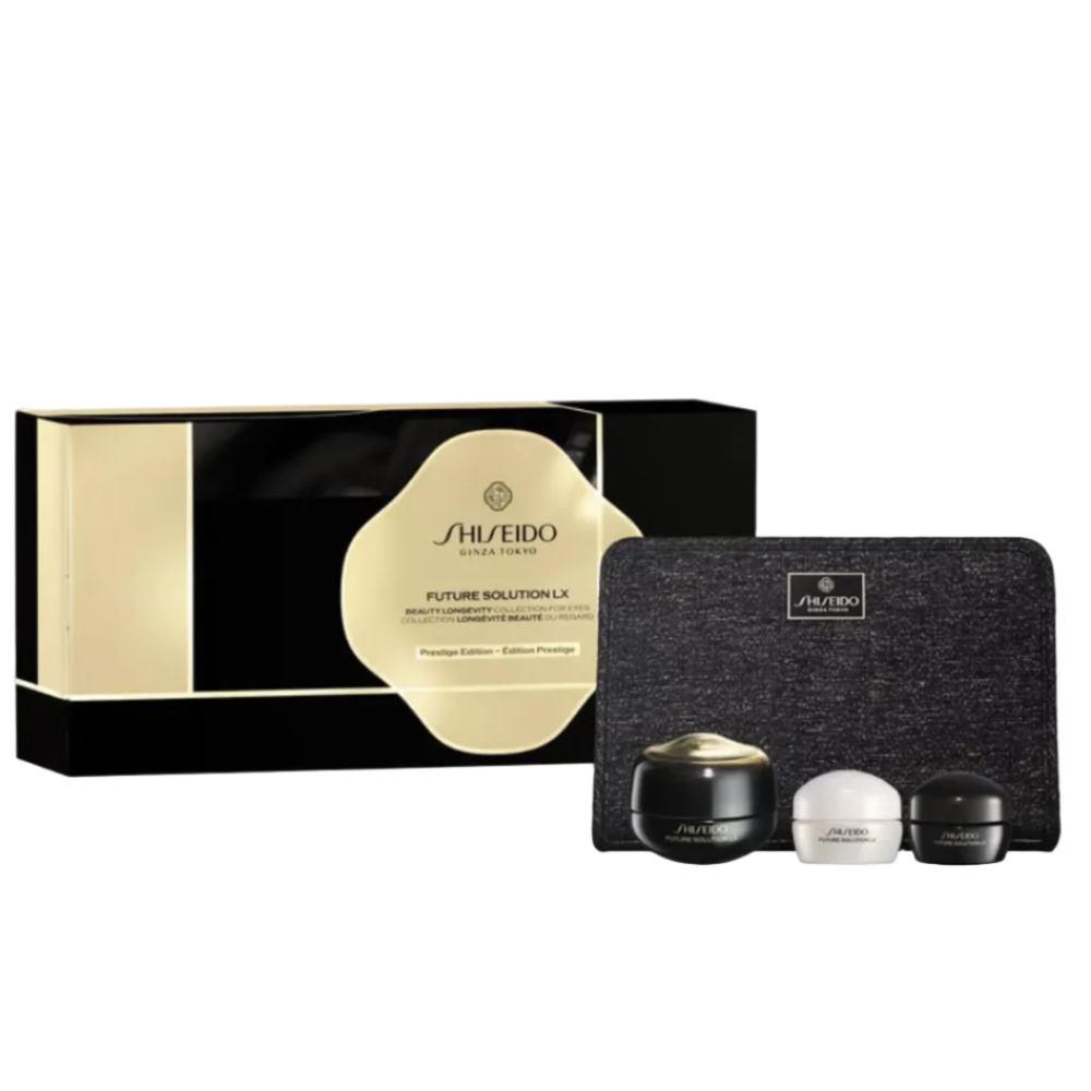 Shiseido Future Solution LX skincare set including a black and gold presentation box, a black textured pouch, and three cosmetic jars (gold, white, and black lids) on a white background.