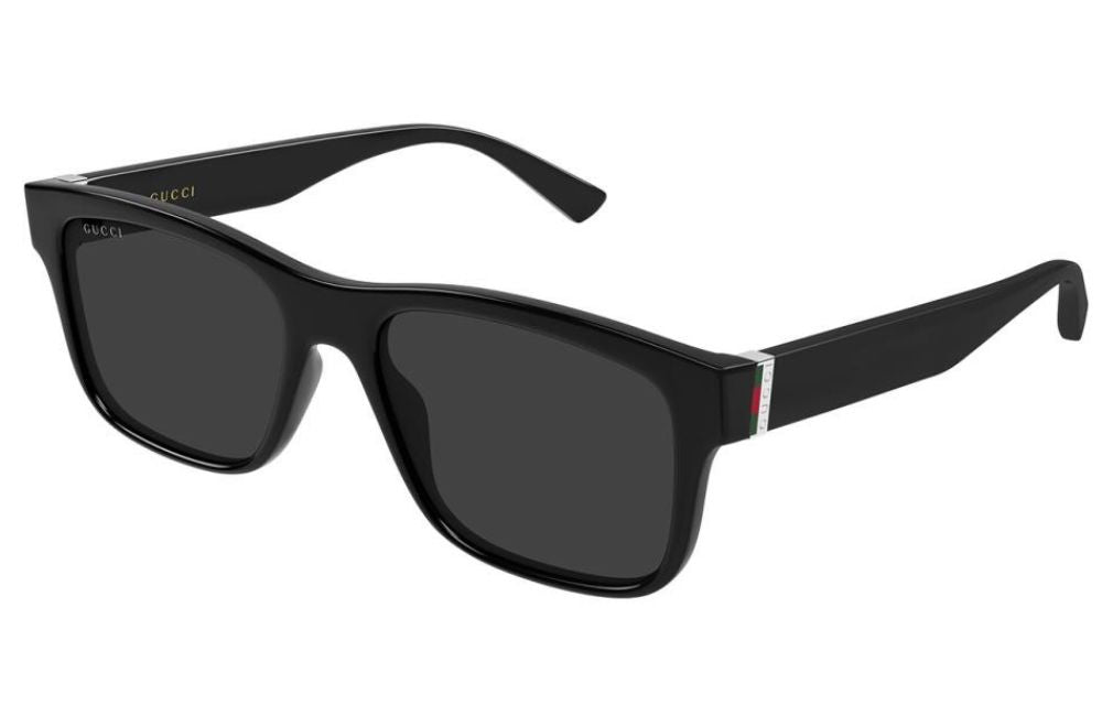 Black sunglasses with dark lenses on a white background