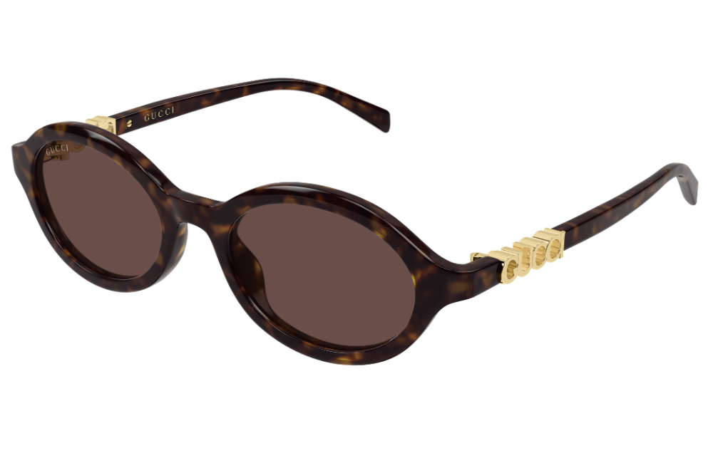 Sunglasses with tortoiseshell frame and brown lenses on a white background