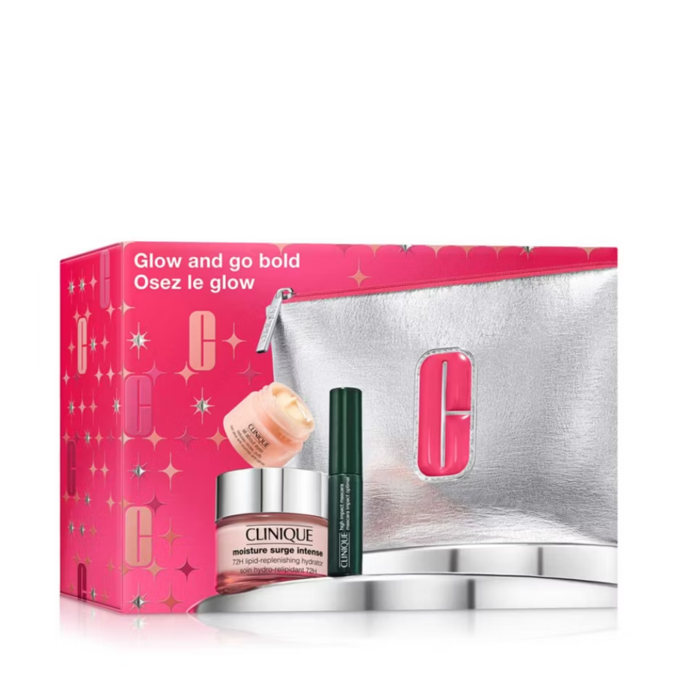 Clinique beauty set with pink packaging and silver pouch on a white background