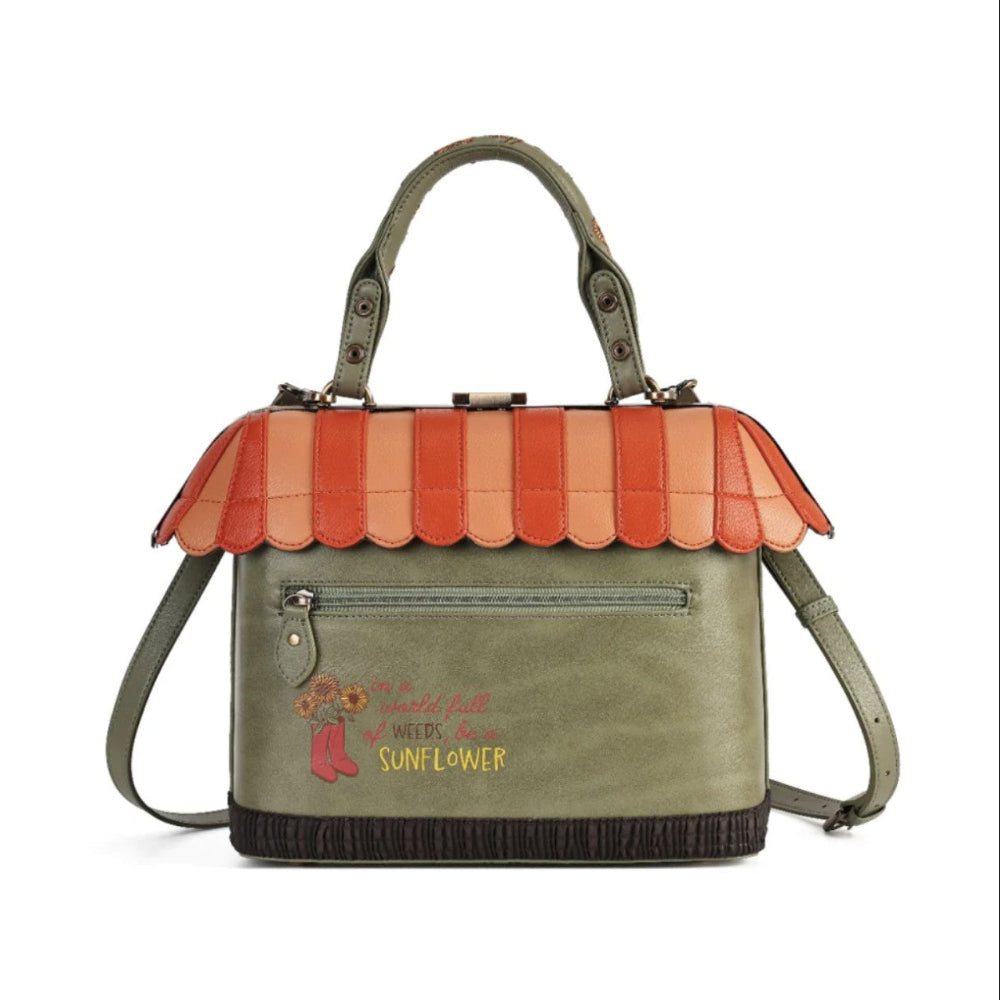 An olive green handbag with a decorative scalloped roof in shades of orange and peach, featuring a fringed bottom edge, dual top handles, a front zip pocket, and a shoulder strap.