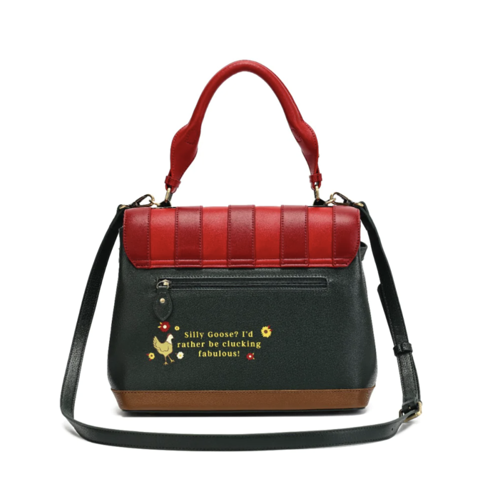 A colour-blocked handbag with a red top handle and flap, a dark green main body, a brown base, and a dark green shoulder strap. The back features a small embroidered chicken graphic and the text 'Silly Goose? I'd rather be chuckling fabulous!'.