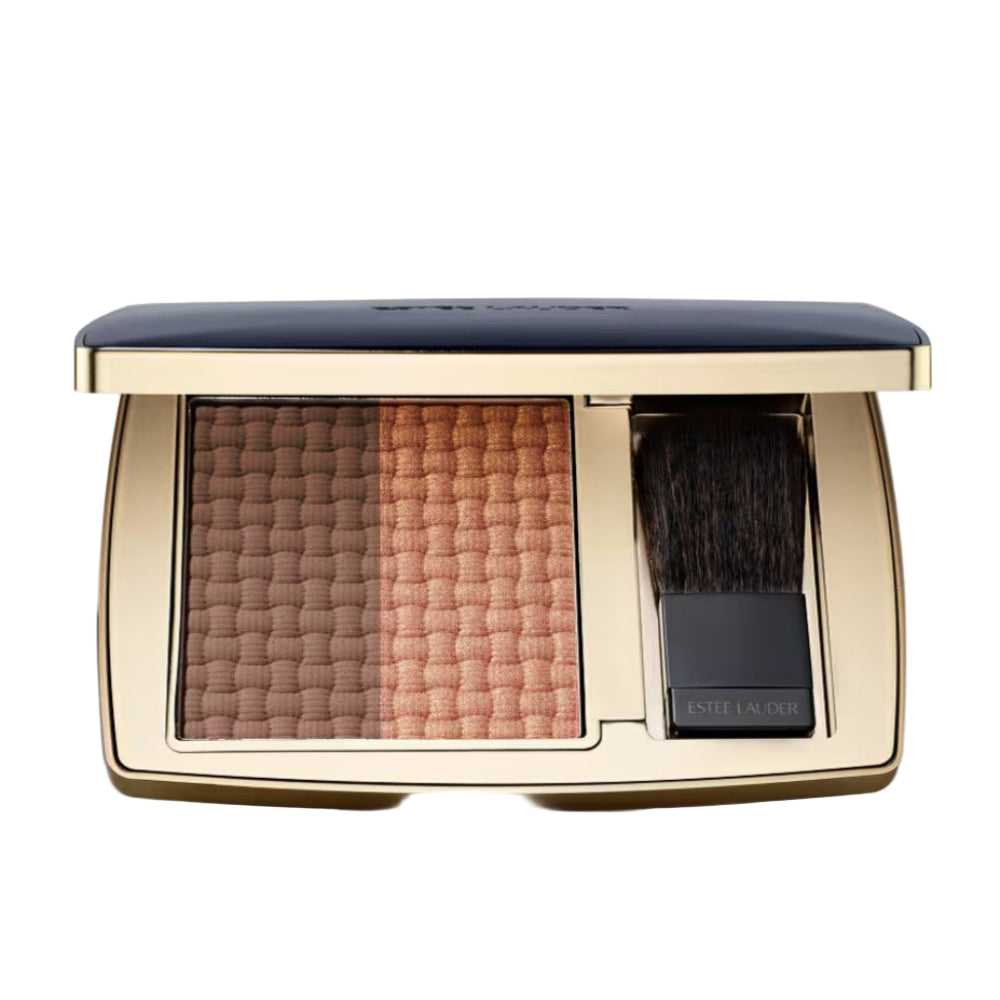 Makeup palette with two shades and a brush on a light gray background