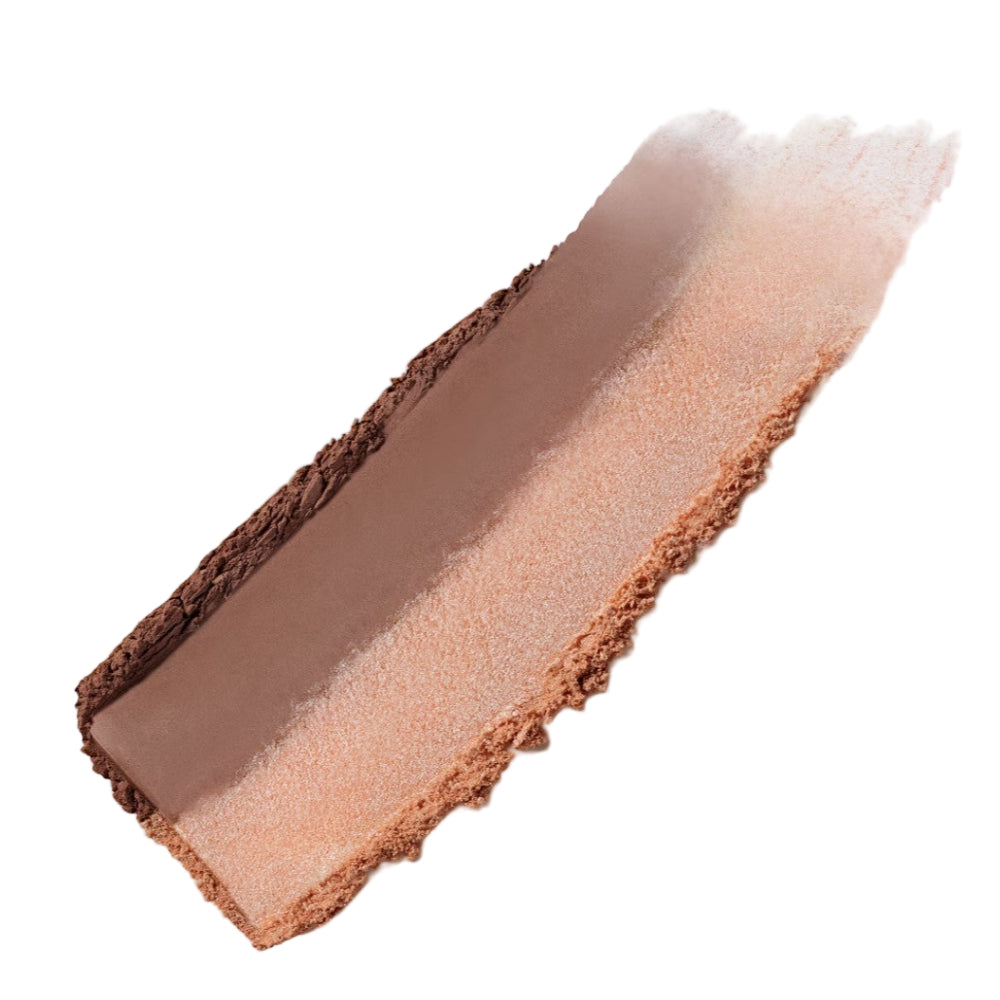 Close-up of a makeup product with a gradient from brown to beige on a light gray background