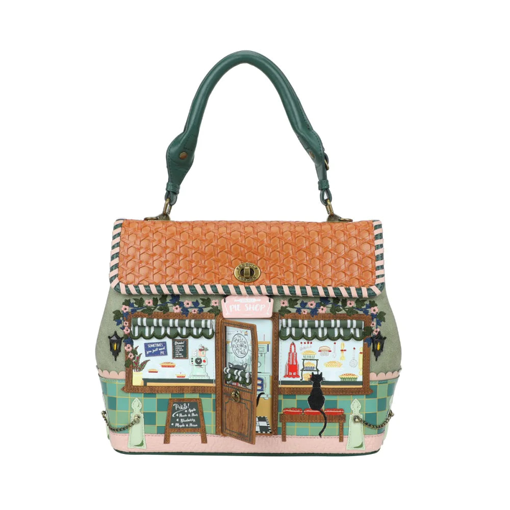 Handbag with a detailed design of a cafe scene on a white background