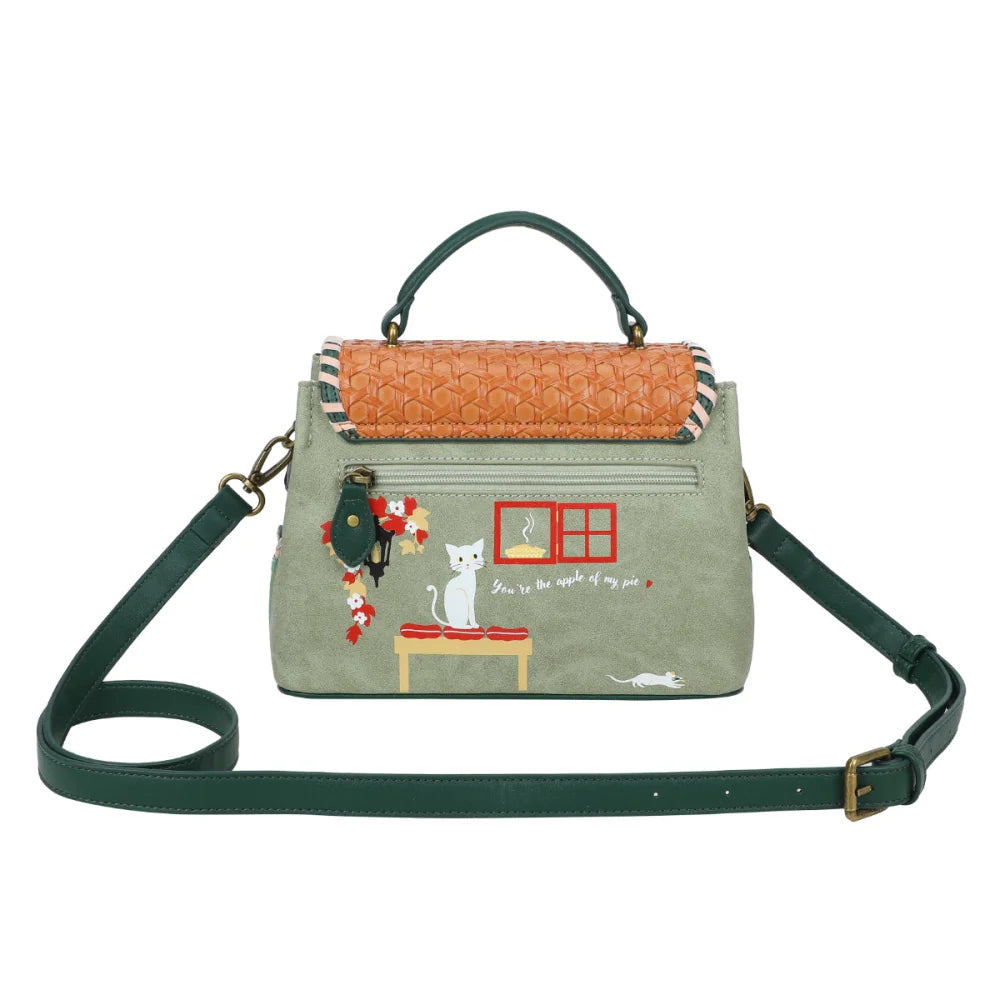 Handbag with cat illustration and text on a white background