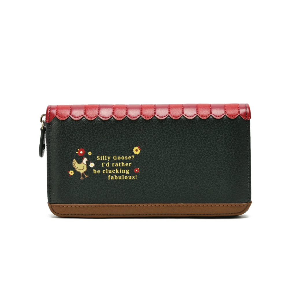 A long zip-around wallet with a dark green pebbled leather body, a bright red scalloped leather top trim, and a brown base trim. The front features a small embroidered goose and the text 'silly Goose? I'd rather be clucking fabulous!' in yellow and white.