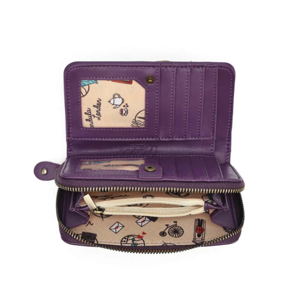 An open purple leather wallet shown from above on a white background, featuring multiple card slots, a zippered compartment, and a beige interior printed with travel-themed illustrations.