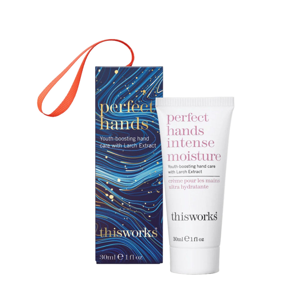 thisworks hand cream packaging with blue box and white tube on a white background