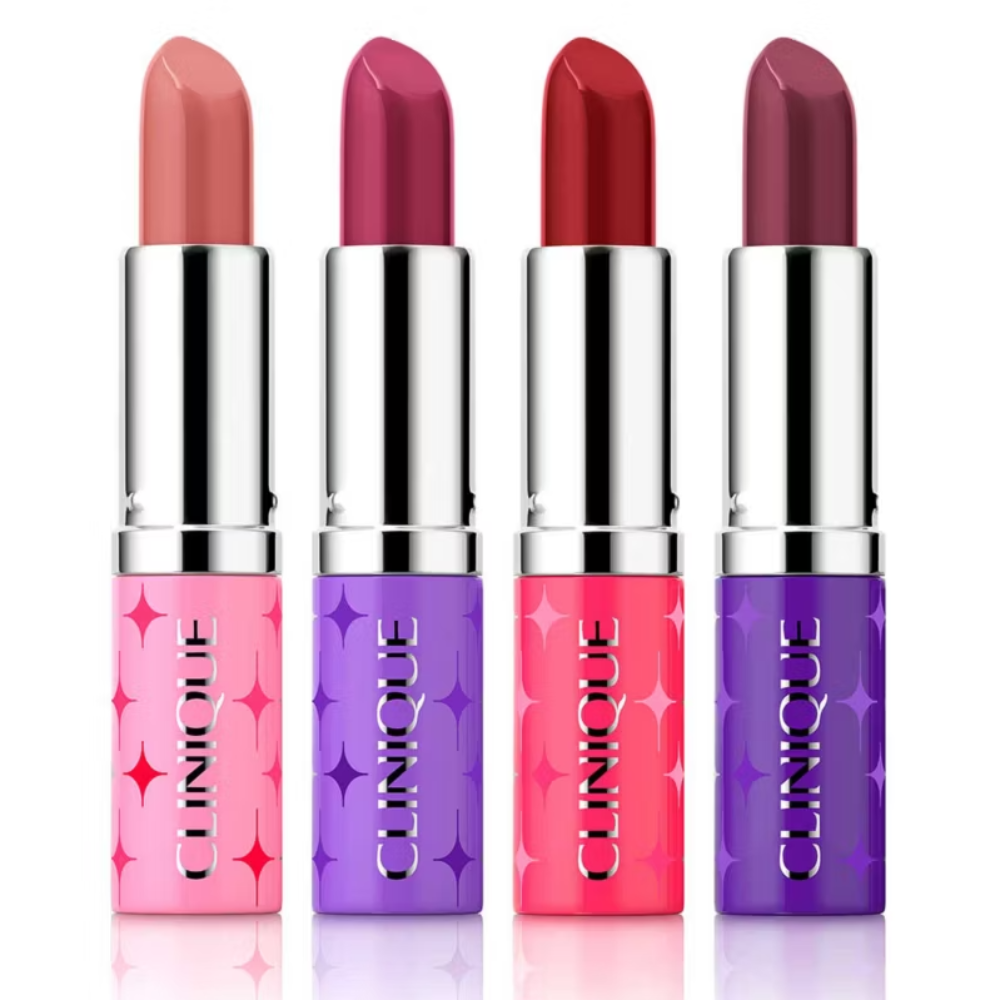 Four Clinique lipsticks in pink and purple shades on a white background