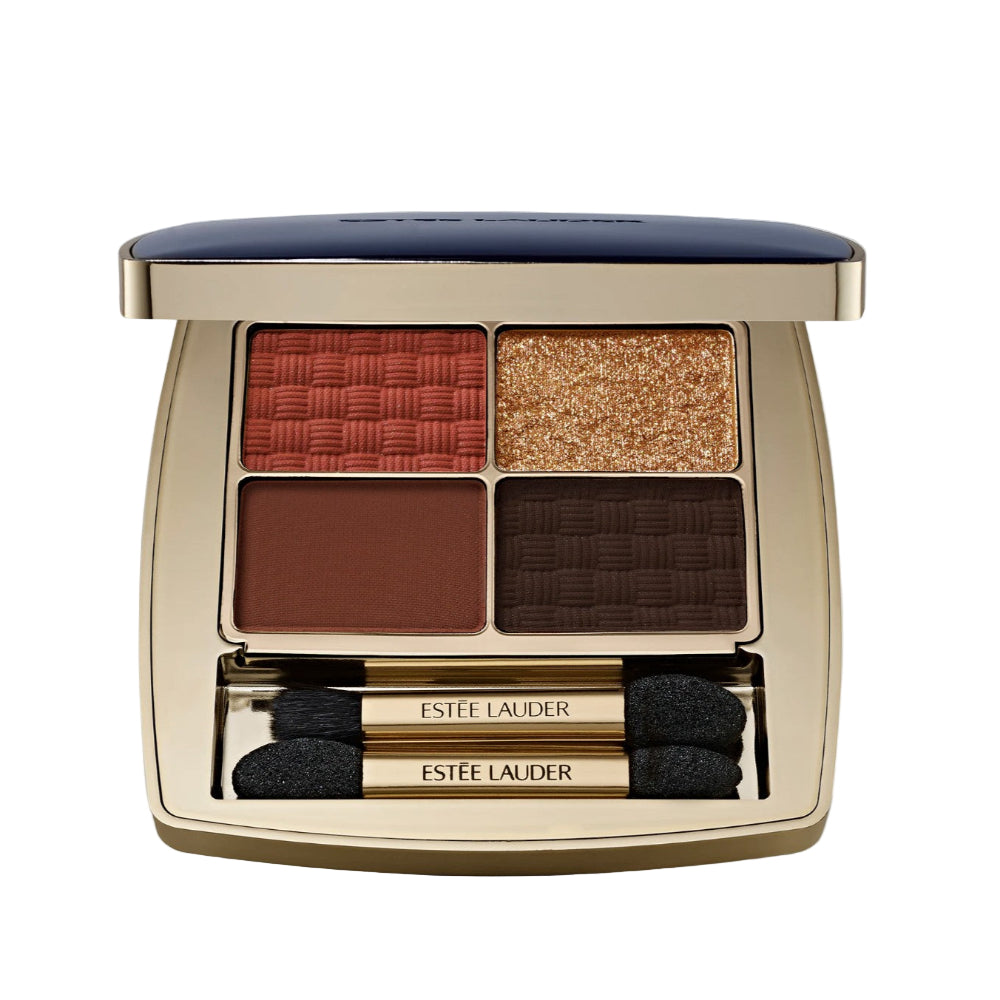 Estée Lauder eyeshadow palette with four colors and two applicators on a light gray background
