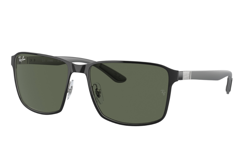 Sunglasses with black frame and green lenses on a white background