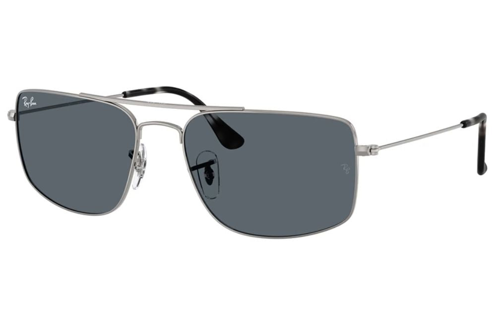 Silver sunglasses with dark lenses on a white background