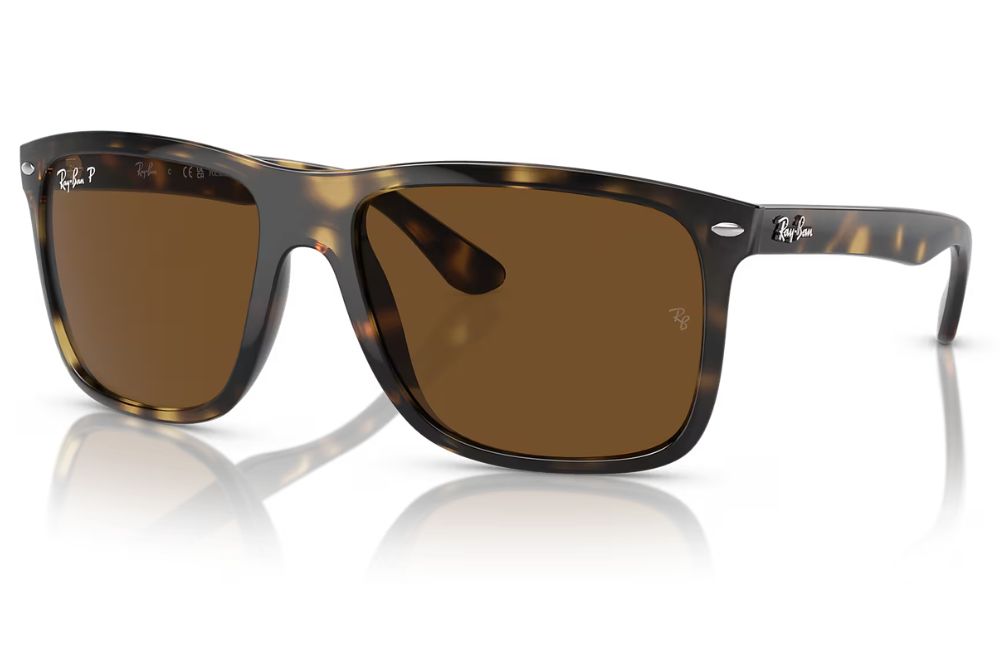 Brown sunglasses with tortoiseshell frame on a white background