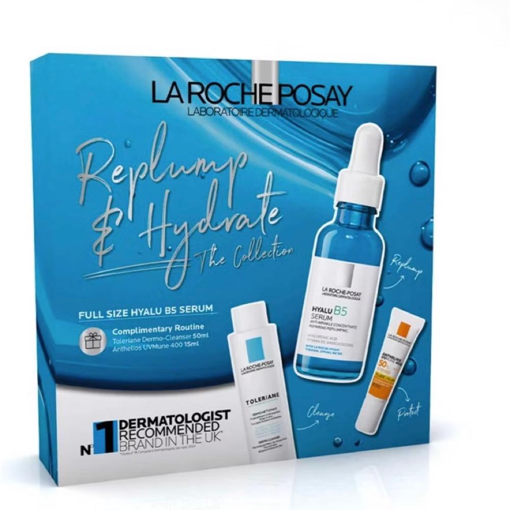La Roche-Posay Replumps & Hydrate Collection Gift Set packaging featuring a bottle of Hyalu B5 Serum, a tube of Toleriane Dermo-cleanser, and a bottle of Anthelios UVMune Invisible Fluid SPF50+.