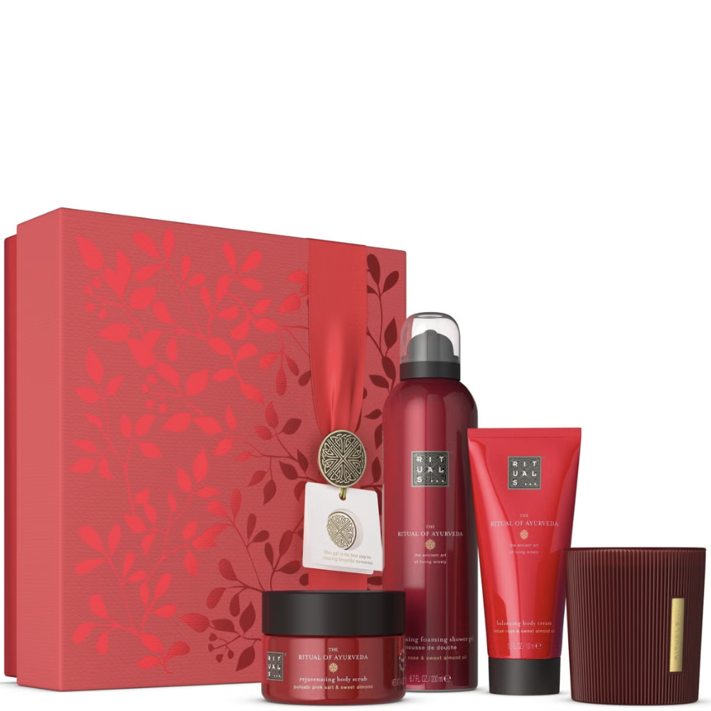 Red beauty product set with a decorative box on a white background