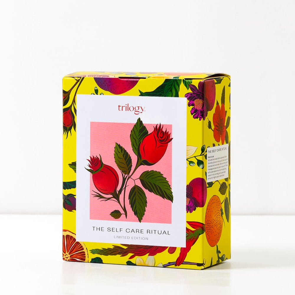Trilogy self-care ritual box with floral design on a white background