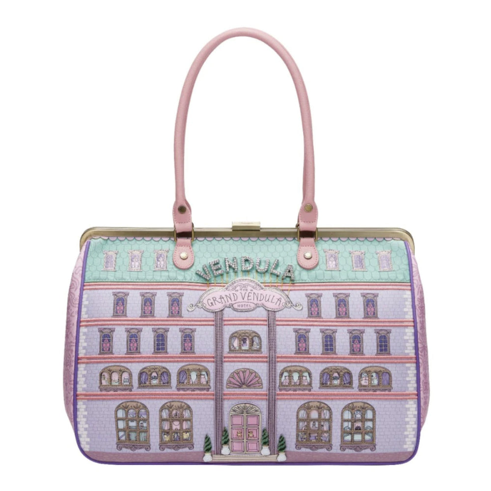 Handbag with building design and 'Vendula' branding on a white background