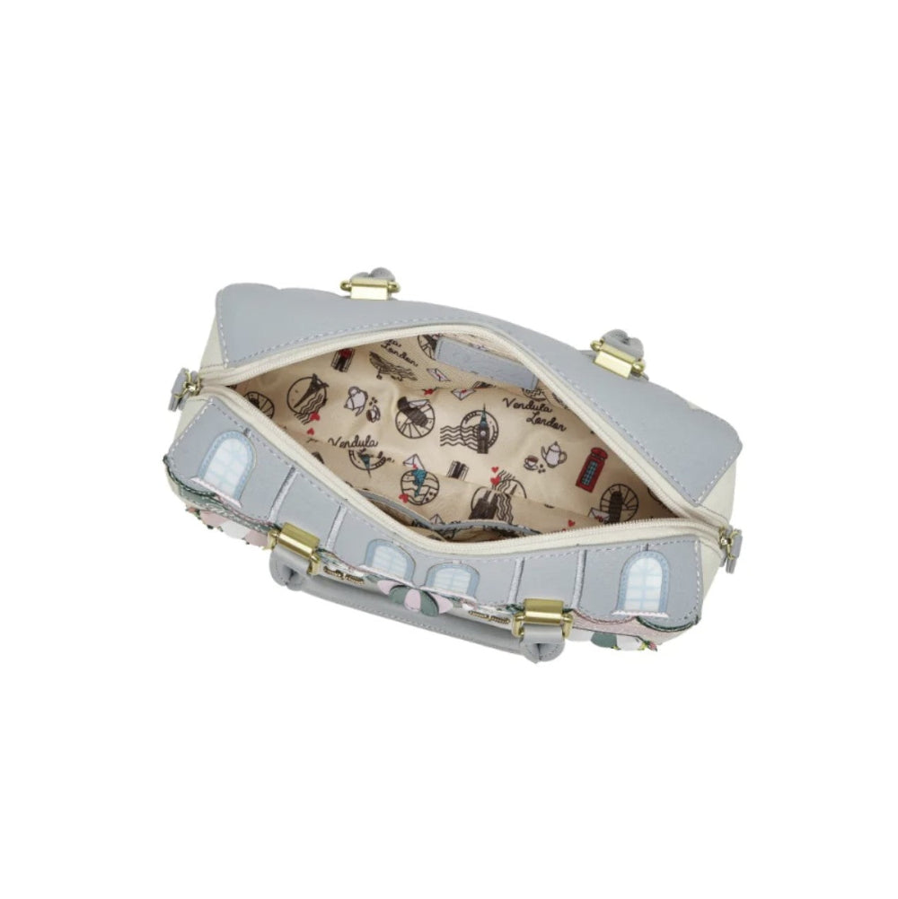 Light gray handbag with gold accents on a white background