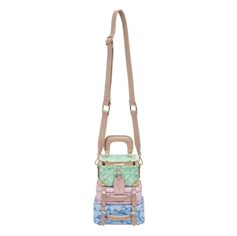 Pastel-colored handbag with a strap on a white background