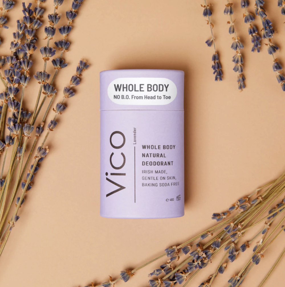 Vico Whole Body natural deodorant on a beige background with lavender.
