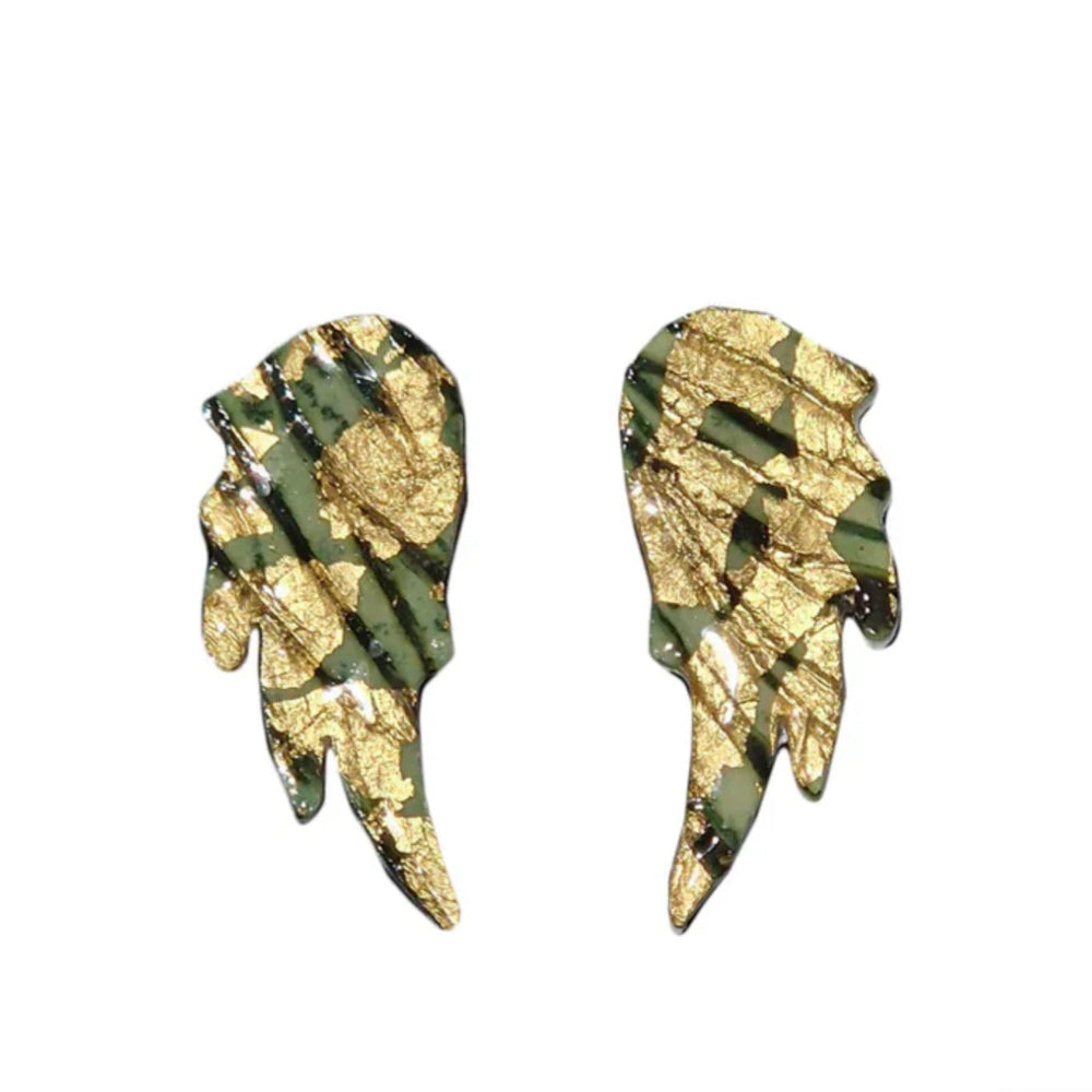 Gold and green leaf-shaped earrings on a white background