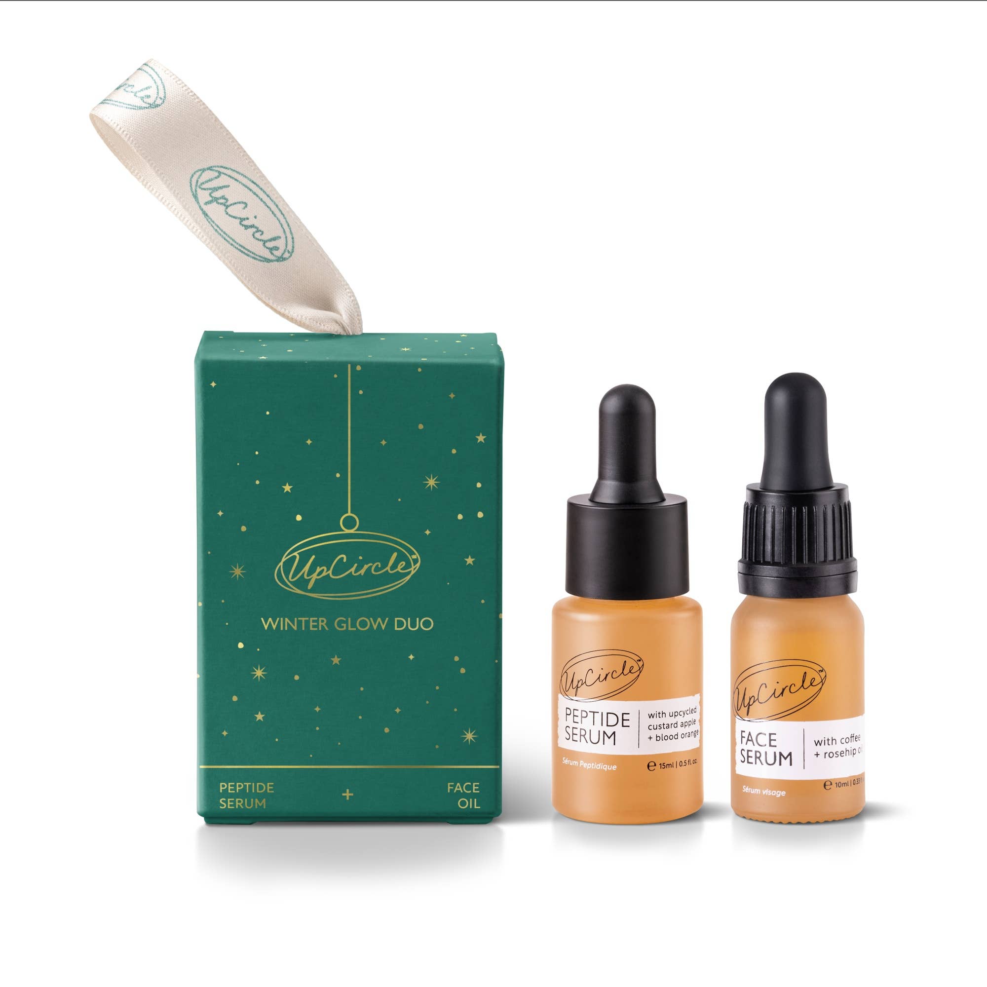 UpCircle skincare products including bottles and a box on a white background