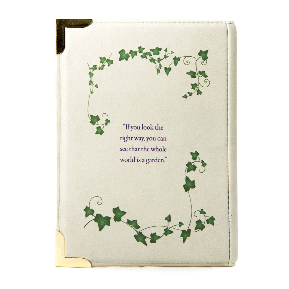 Notebook with green ivy design and inspirational quote on a white background
